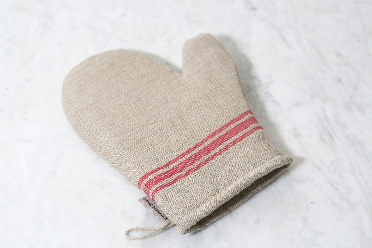 Red stripe linen oven mitt. Made in France.