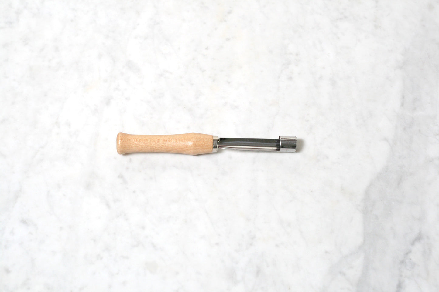 German apple corer with wooden handle