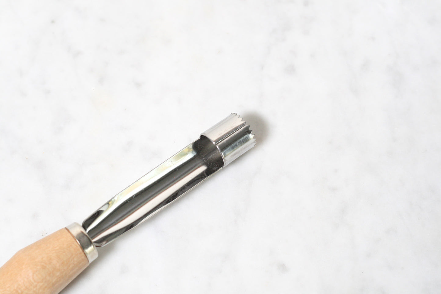 German apple corer with wooden handle