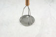Stainless steel potato masher with wooden handle, made in France.
