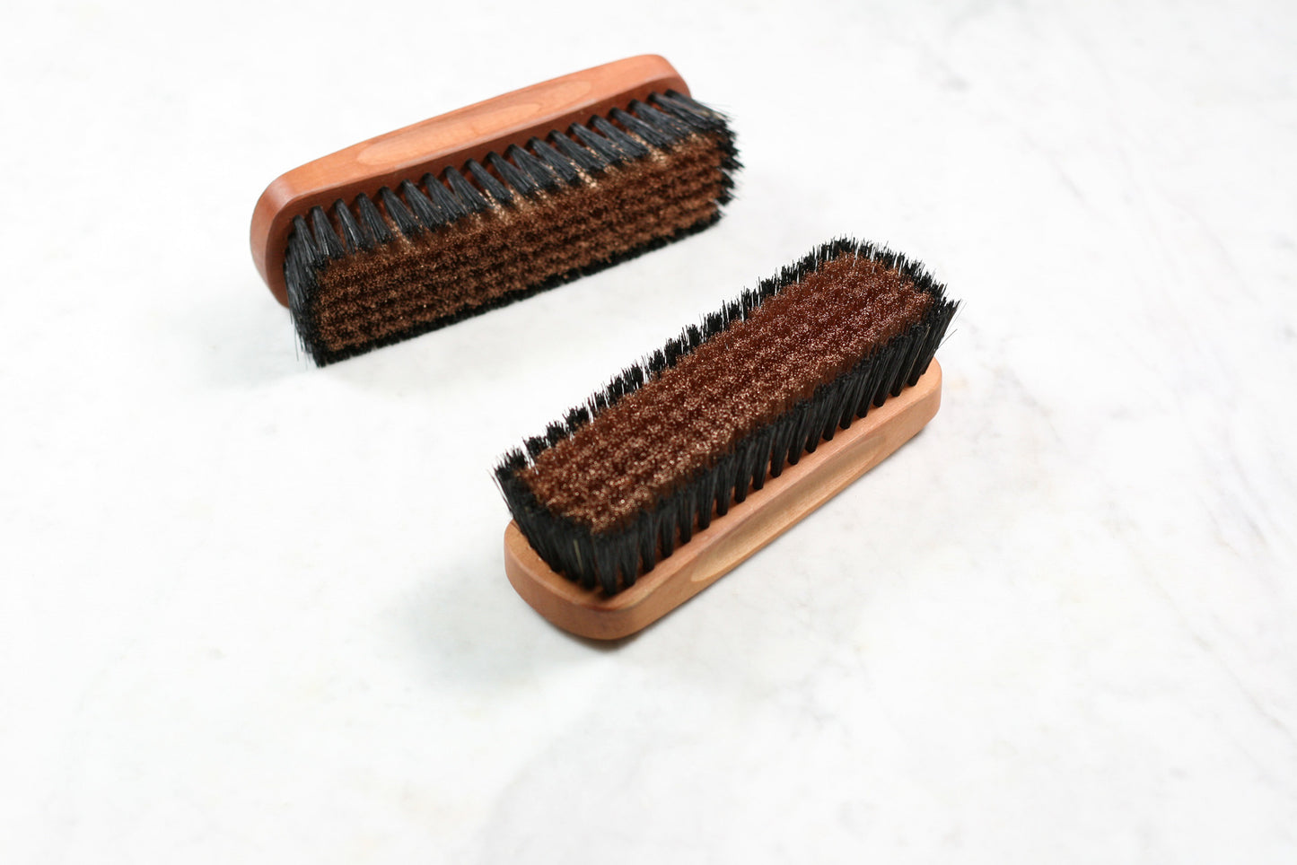 Burstenhaus Redecker sweater brush with natural and bronze bristles. 