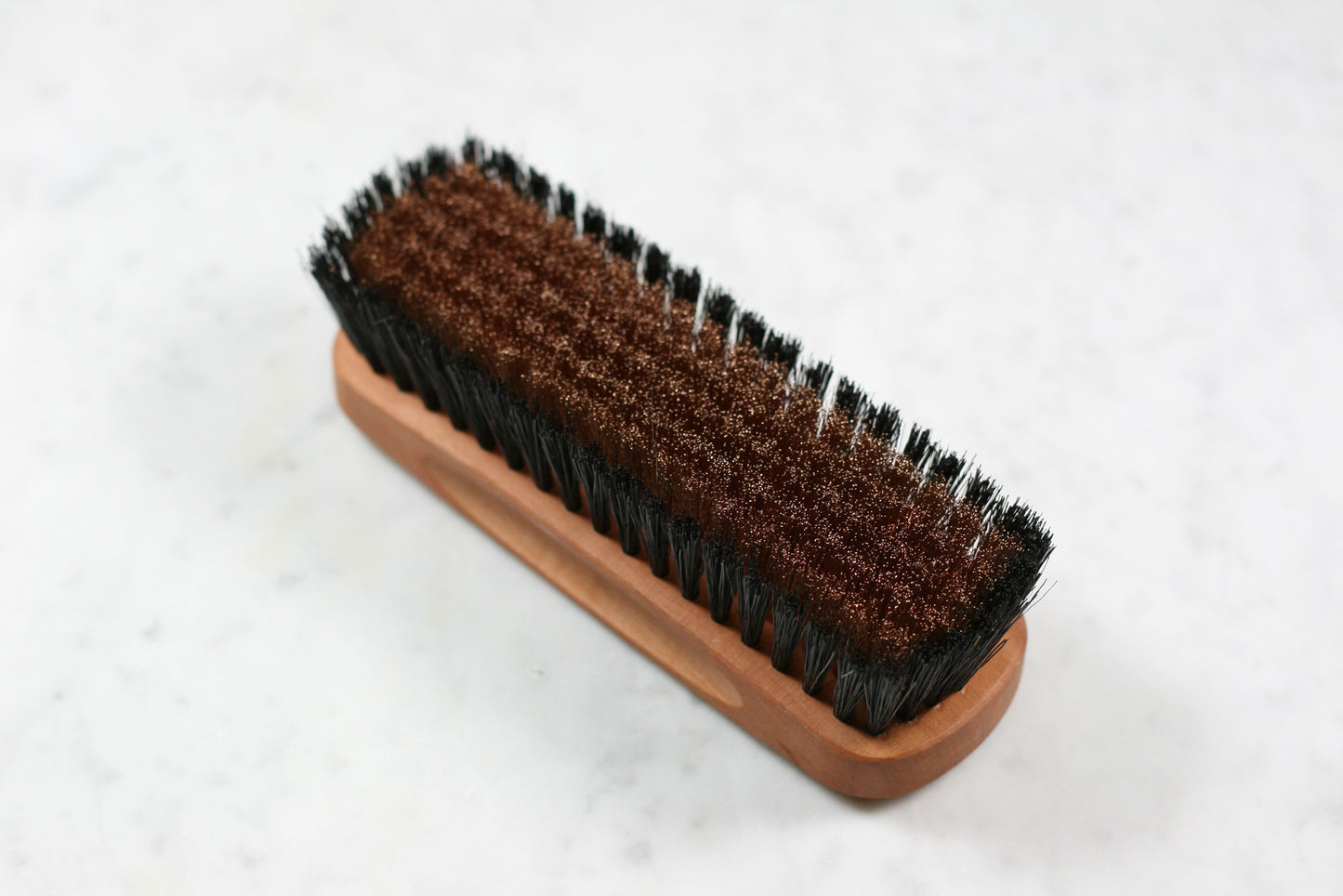 Burstenhaus Redecker sweater brush with natural and bronze bristles. 